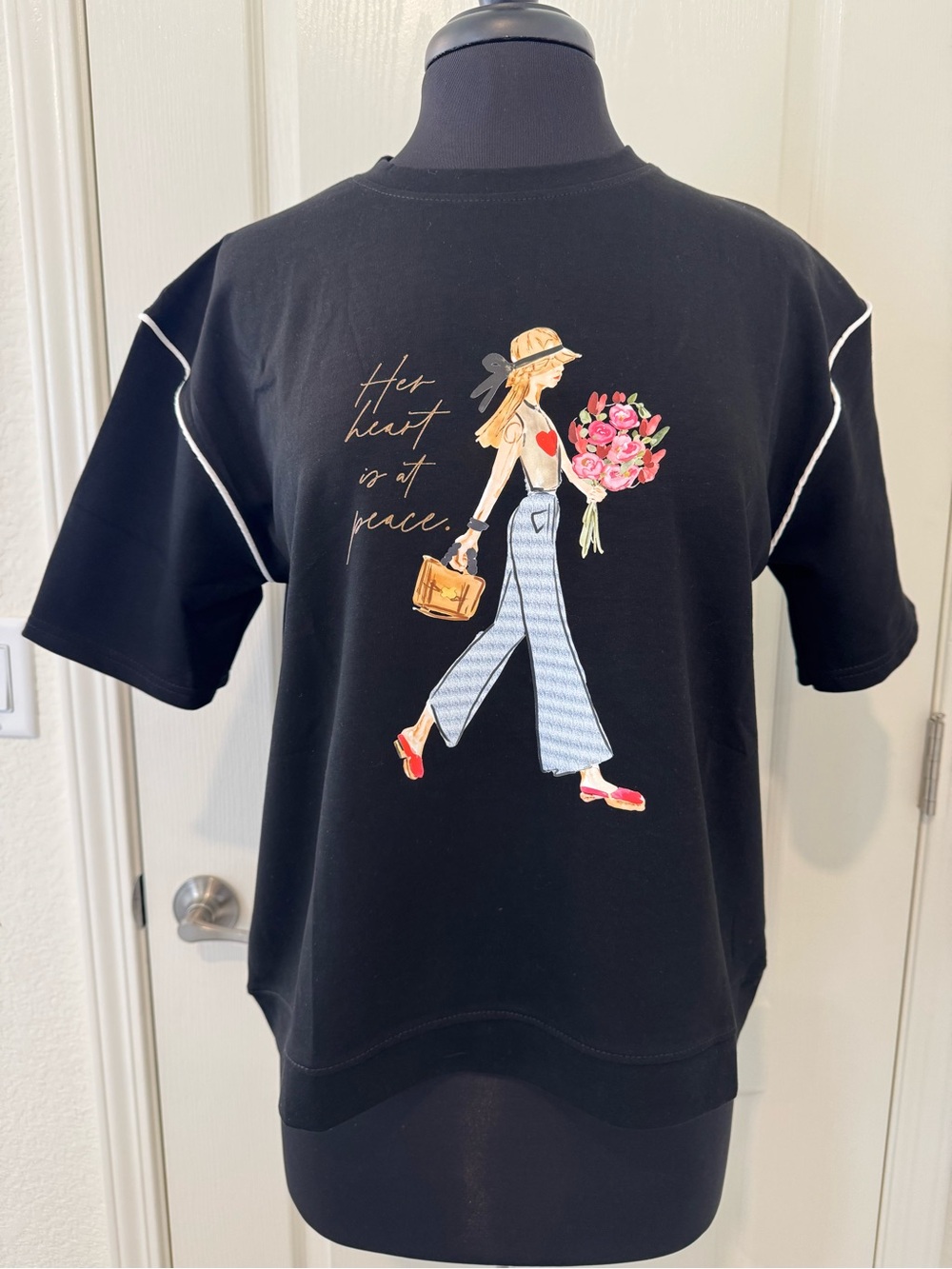 Black Graphic Tee with Floral Walk Illustration